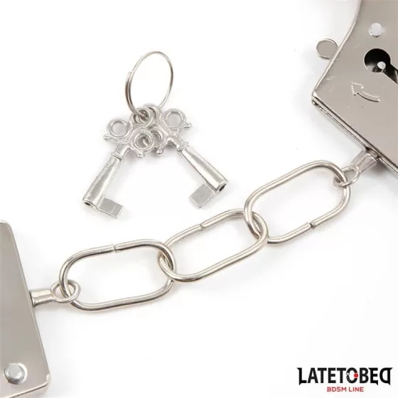 LateToBed – fém csuklóbilincs fekete plüss huzattal "B" kategória
